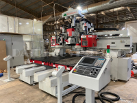MÁY CNC TRUNG TÂM 2 BÀN 3 TRỤC THAY DAO TỰ ĐỘNG 1741