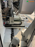 MÁY PHAY CNC 5 TRỤC 12 ĐẦU 48 DAO (kẹp chống tâm) WOODMASTER 4850